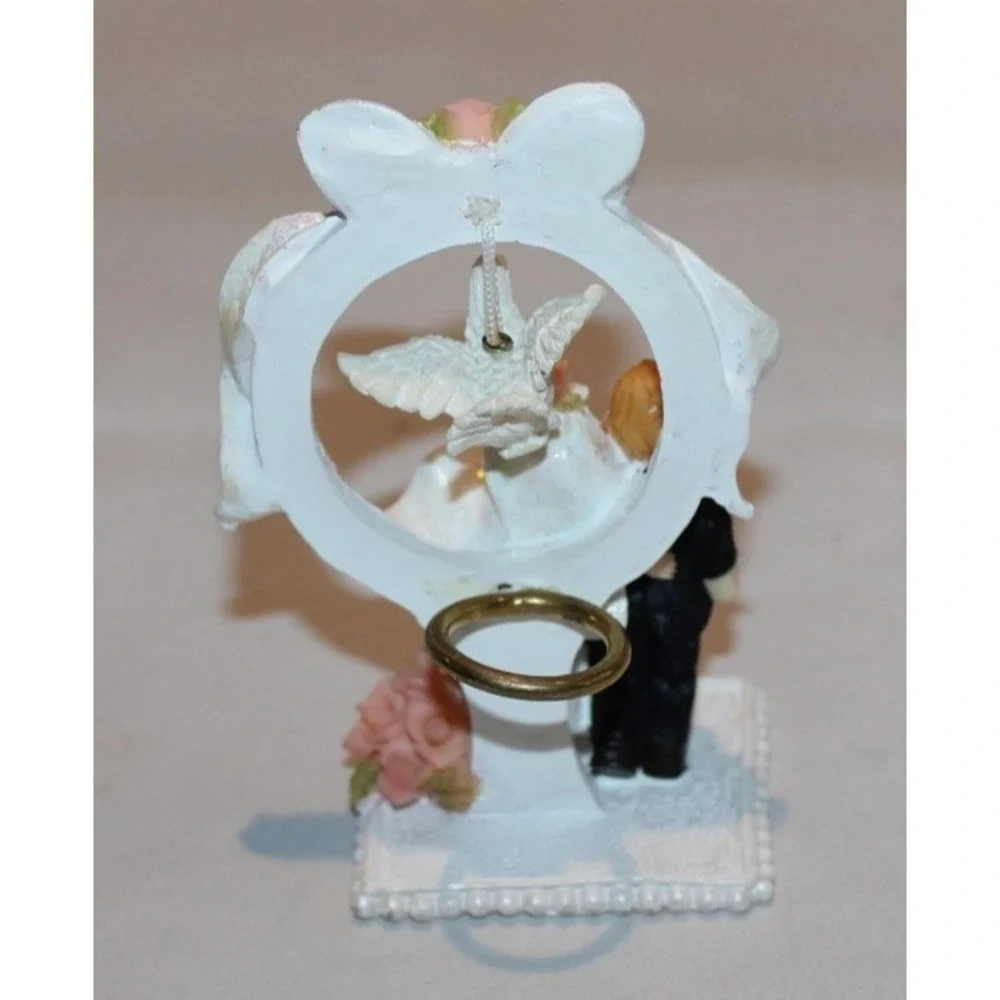 vintage bride & groom wedding cake topper with dove & ring in back